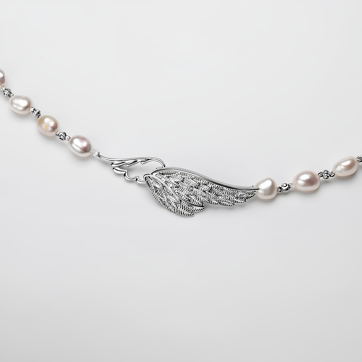 The Aurélie Necklace - 57.5cm Ethereal Angel Wing Pearl Strand with Custom Silhouette Clasp
