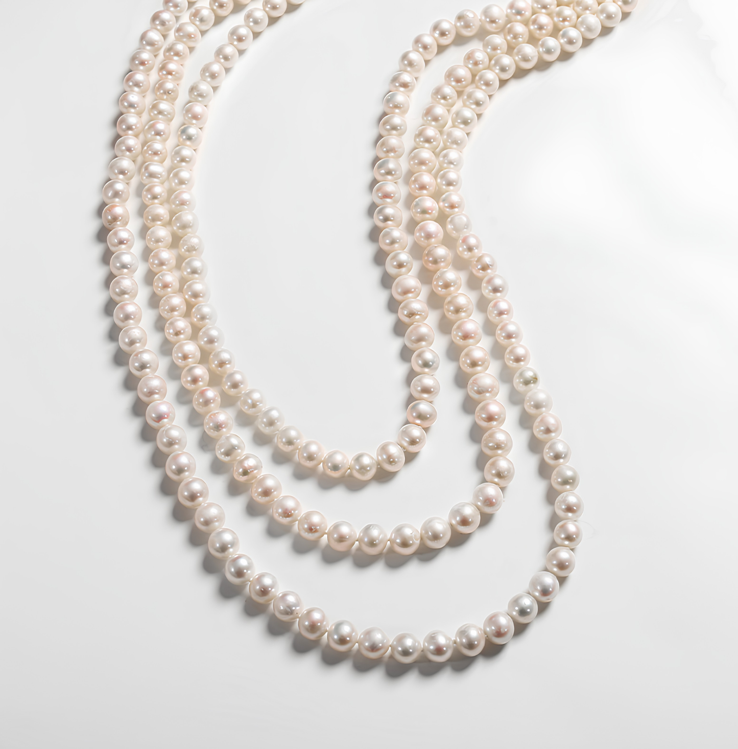 The Gabrielle Necklace - 1.6m Iconic 6-7mm Pearl Rope with Silver Bowknot Clasp