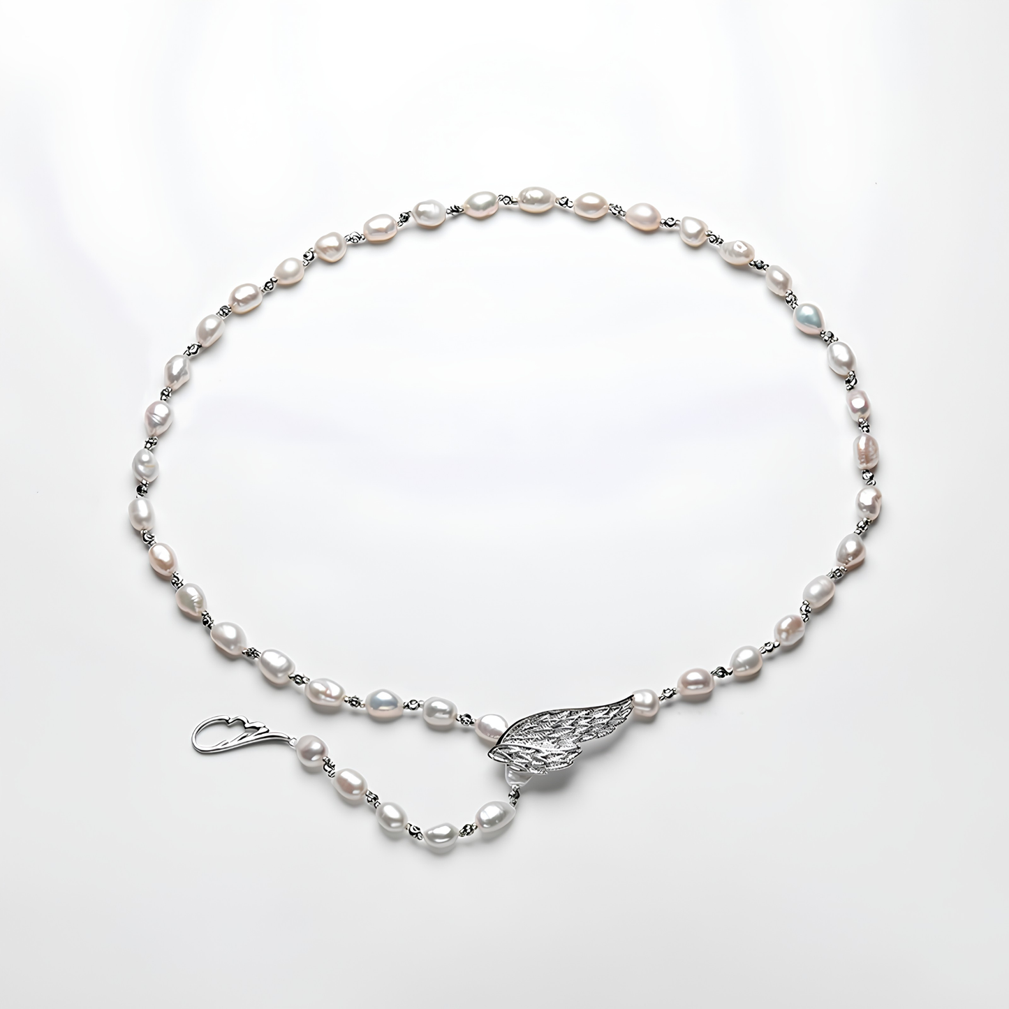 The Aurélie Necklace - 57.5cm Ethereal Angel Wing Pearl Strand with Custom Silhouette Clasp