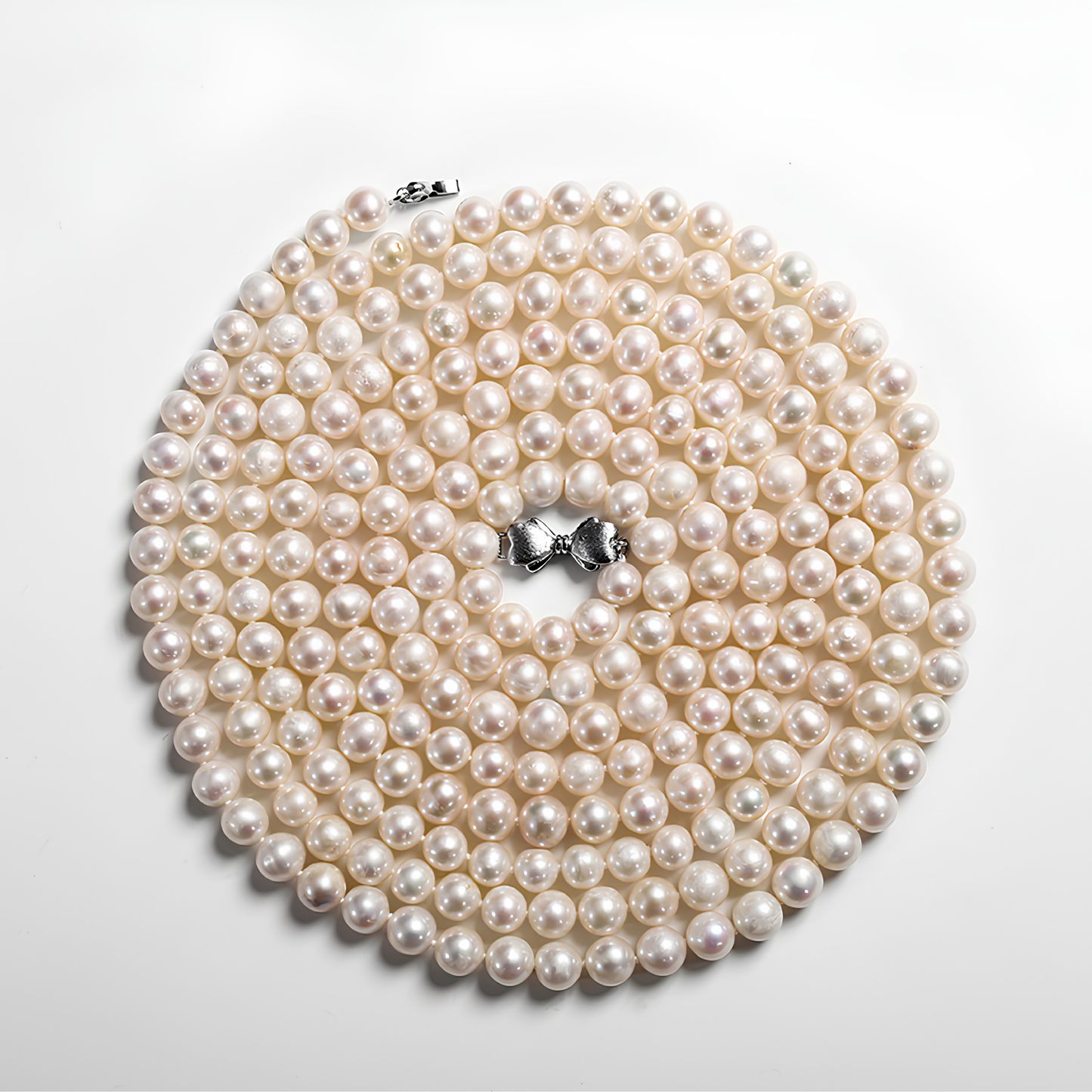 The Gabrielle Necklace - 1.6m Iconic 6-7mm Pearl Rope with Silver Bowknot Clasp