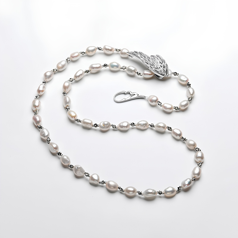 The Aurélie Necklace - 57.5cm Ethereal Angel Wing Pearl Strand with Custom Silhouette Clasp