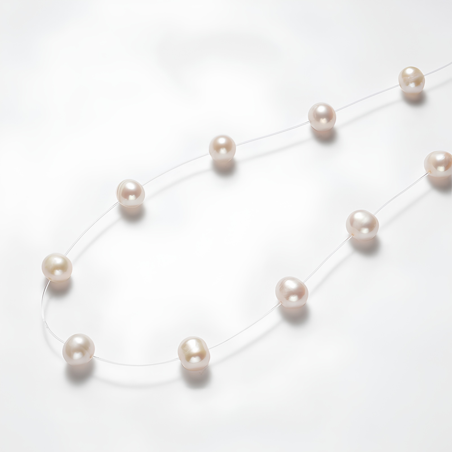 The Aiko Necklace - Minimalist Invisible "Floating Star" Freshwater Pearl Strand