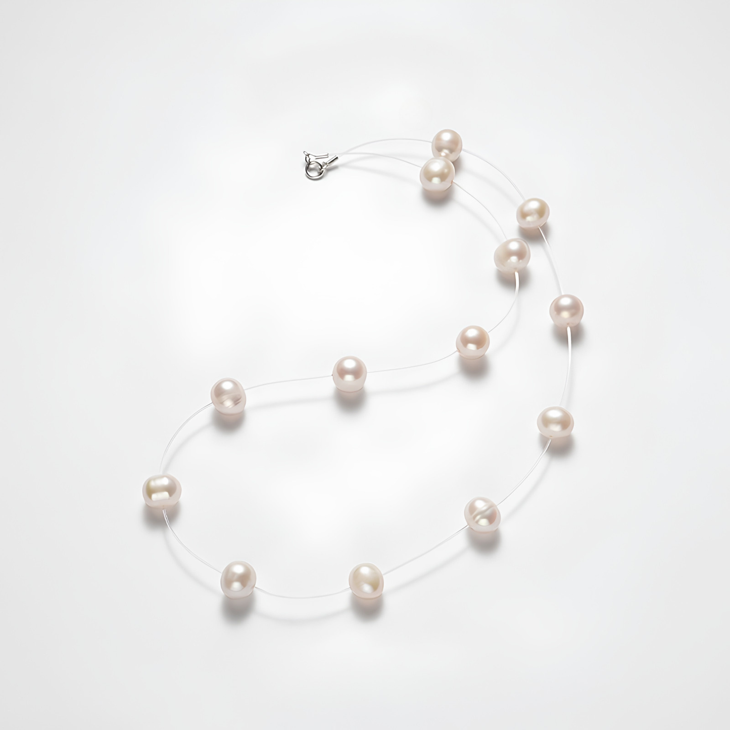 The Aiko Necklace - Minimalist Invisible "Floating Star" Freshwater Pearl Strand