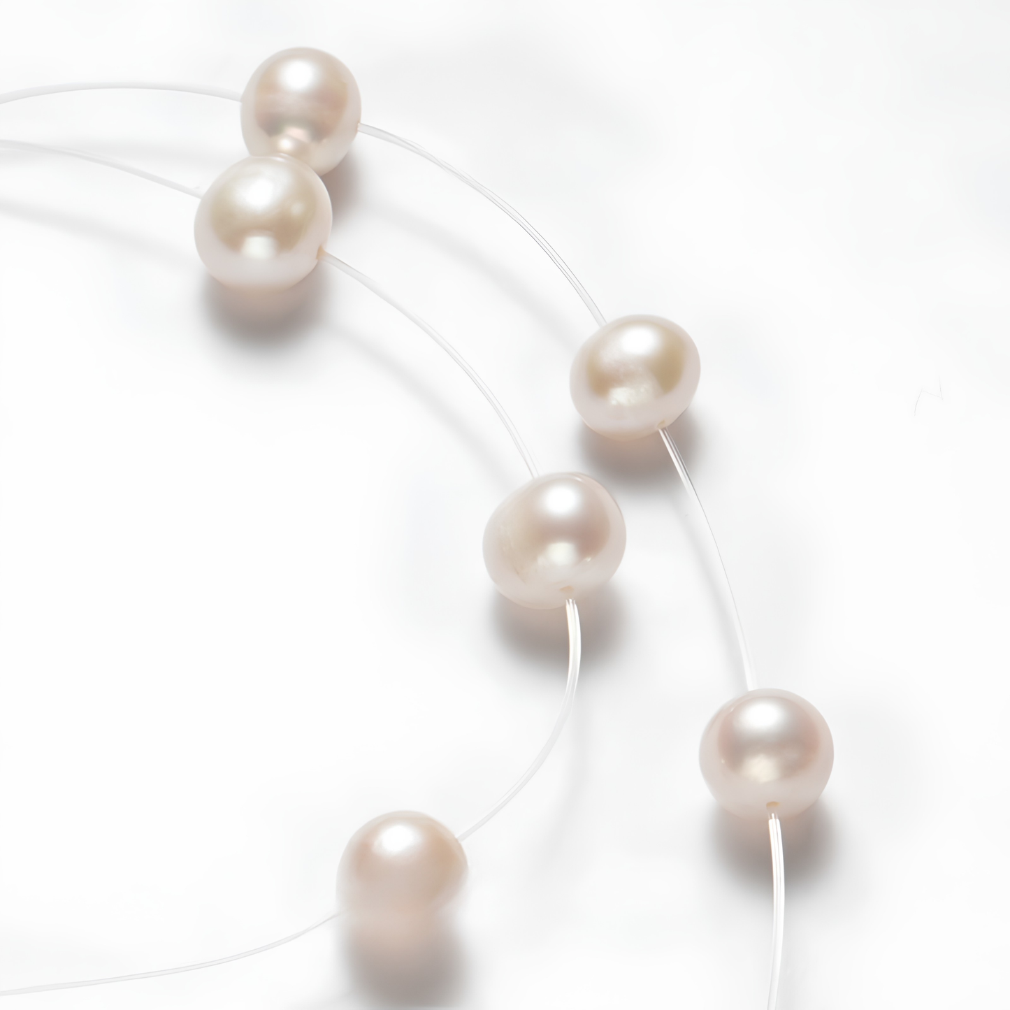 The Aiko Necklace - Minimalist Invisible "Floating Star" Freshwater Pearl Strand